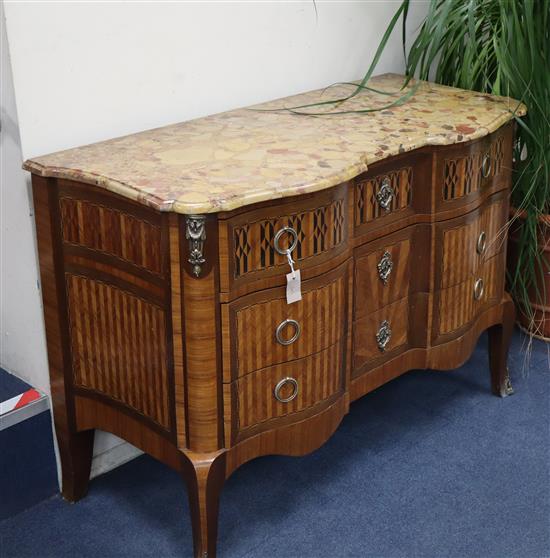 A French transitional style marble top bombe commode W.128cm